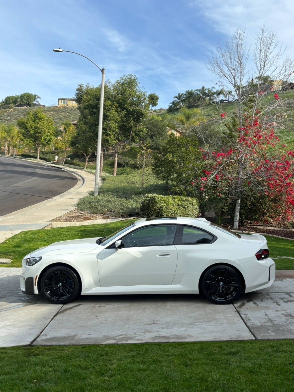 Clean white BMW M2 coupe after StarFinish professional detailing service